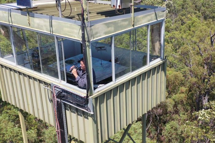 PHOTO: Tony Hoffman at work in the tower. (ABC South West WA: Mark Bennett)