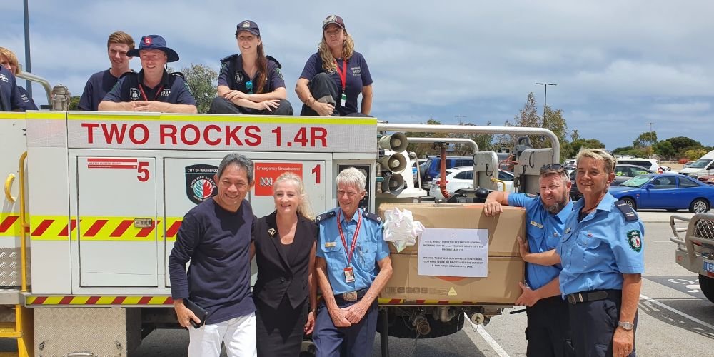 Two Rocks Volunteer Bush Fire Brigade members with Yanchep Beach Joint Venture chief executive Gin Wah Ang and Wanneroo Mayor Tracey Roberts. Pictures supplied