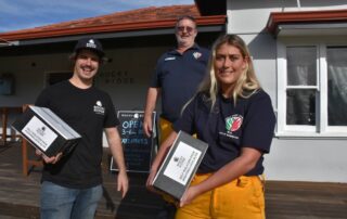 Rocky Ridge cellar door manager Liam Marsh with Sussex bushfire volunteers Mark Smith and Ashleigh Charlton.