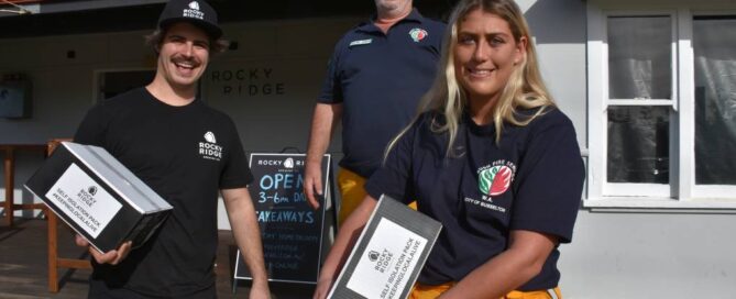 Rocky Ridge cellar door manager Liam Marsh with Sussex bushfire volunteers Mark Smith and Ashleigh Charlton.
