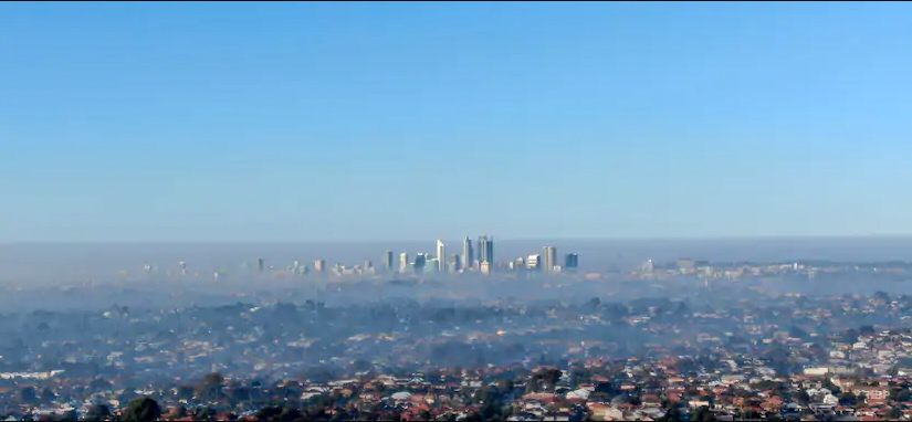 Smoke haze over the city and suburbs due to burnoffs. Credit: Simon Hydzik 7NEWS/7NEWS, Simon Hydzik/7NEWS