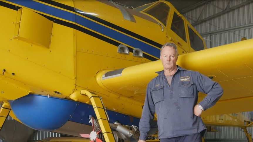 Scott Mackie and his water bomber plane, which are not contracted to fly around Esperance.(ABC Esperance: Emily Smith)